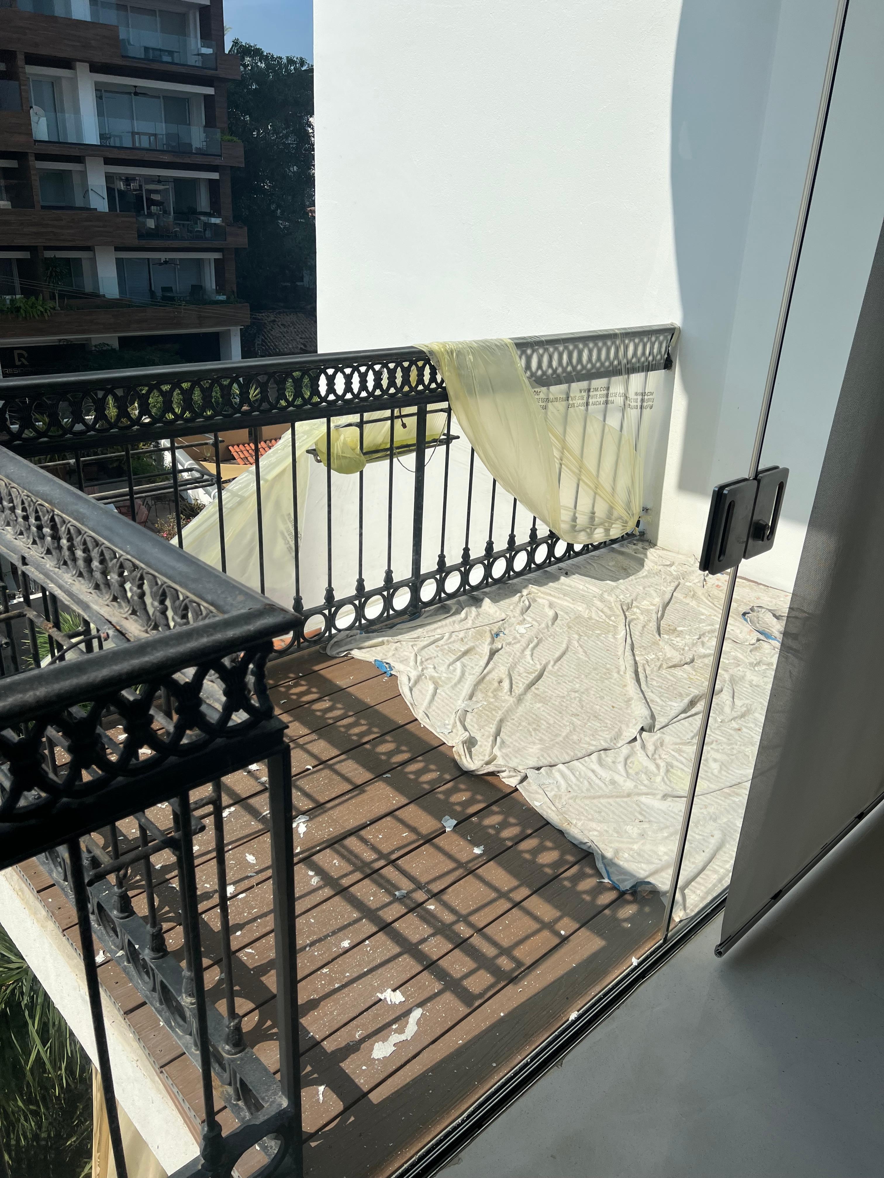 Balcony off limits, under construction.