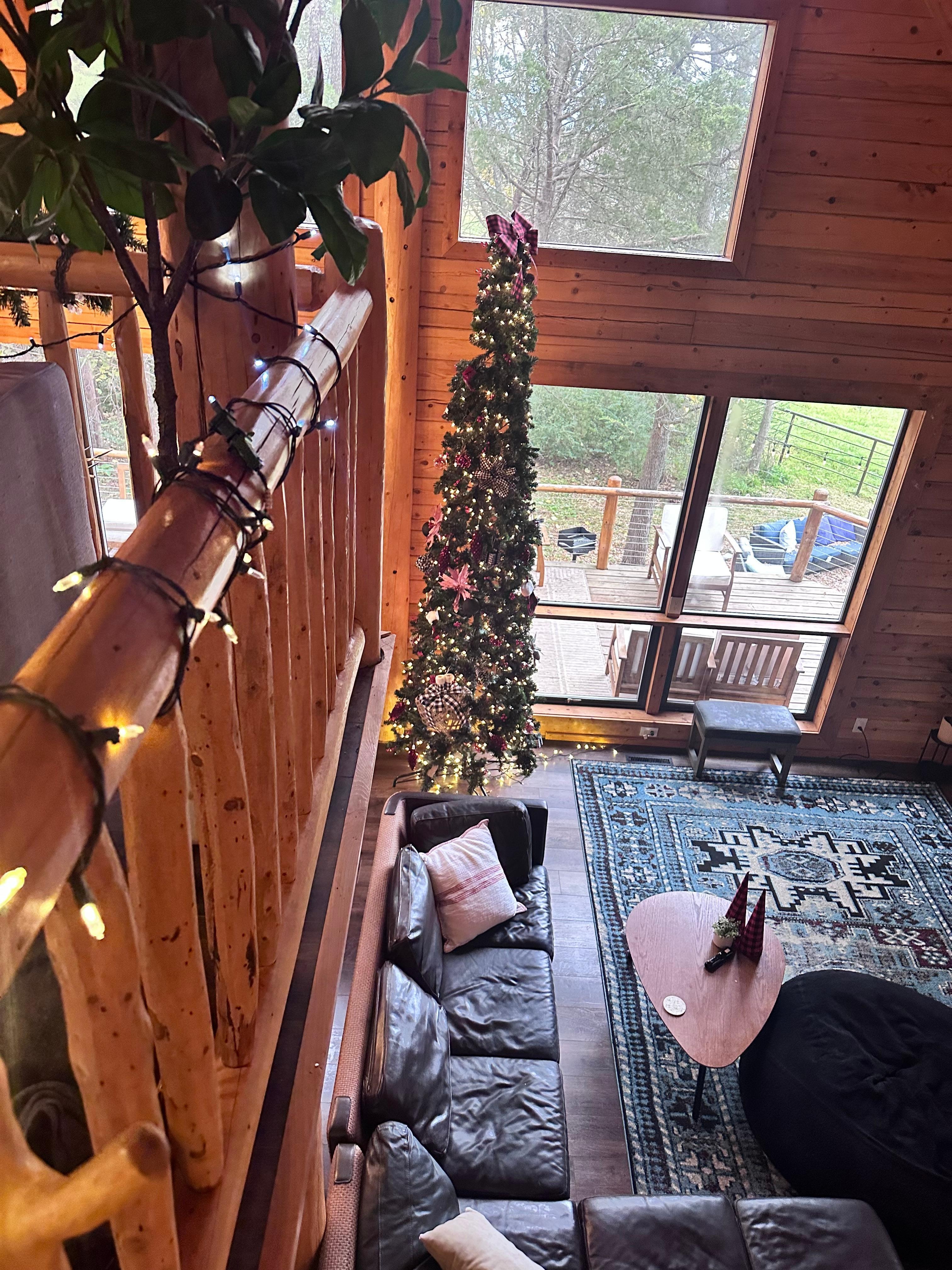 The view of the living room from top of the staircase. 