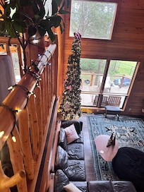 The view of the living room from top of the staircase.