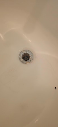 Drain shower which needed to be unplugged when my daughter bathed