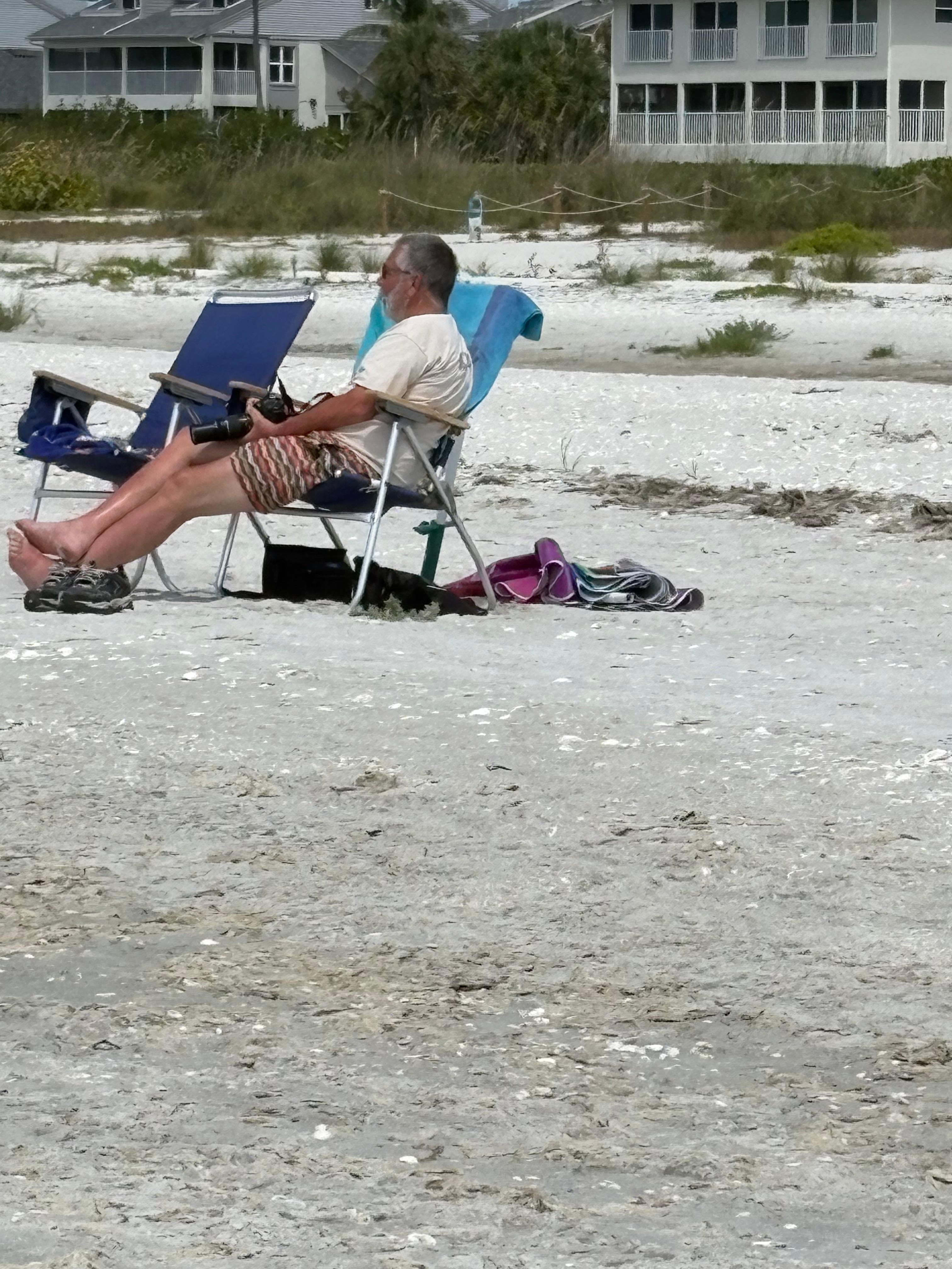 Relaxing on the beach. Appreciated having chairs and an umbrella available. 