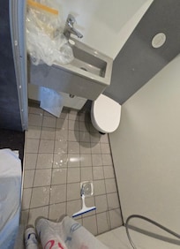 Toilet seat is always wet and we had to share this claustrophobic toilet/bath. There is no tissue holder and it gets wet all the time!