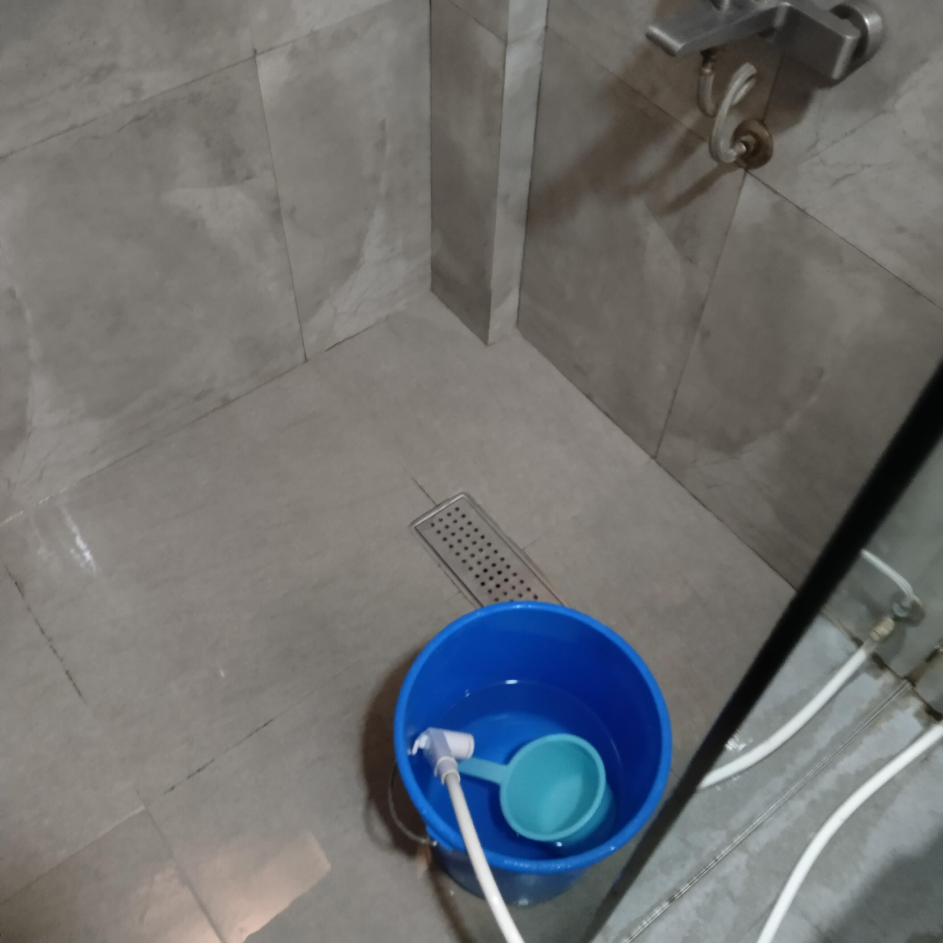 This how you take a shower in this hotel. You use a bucket. 