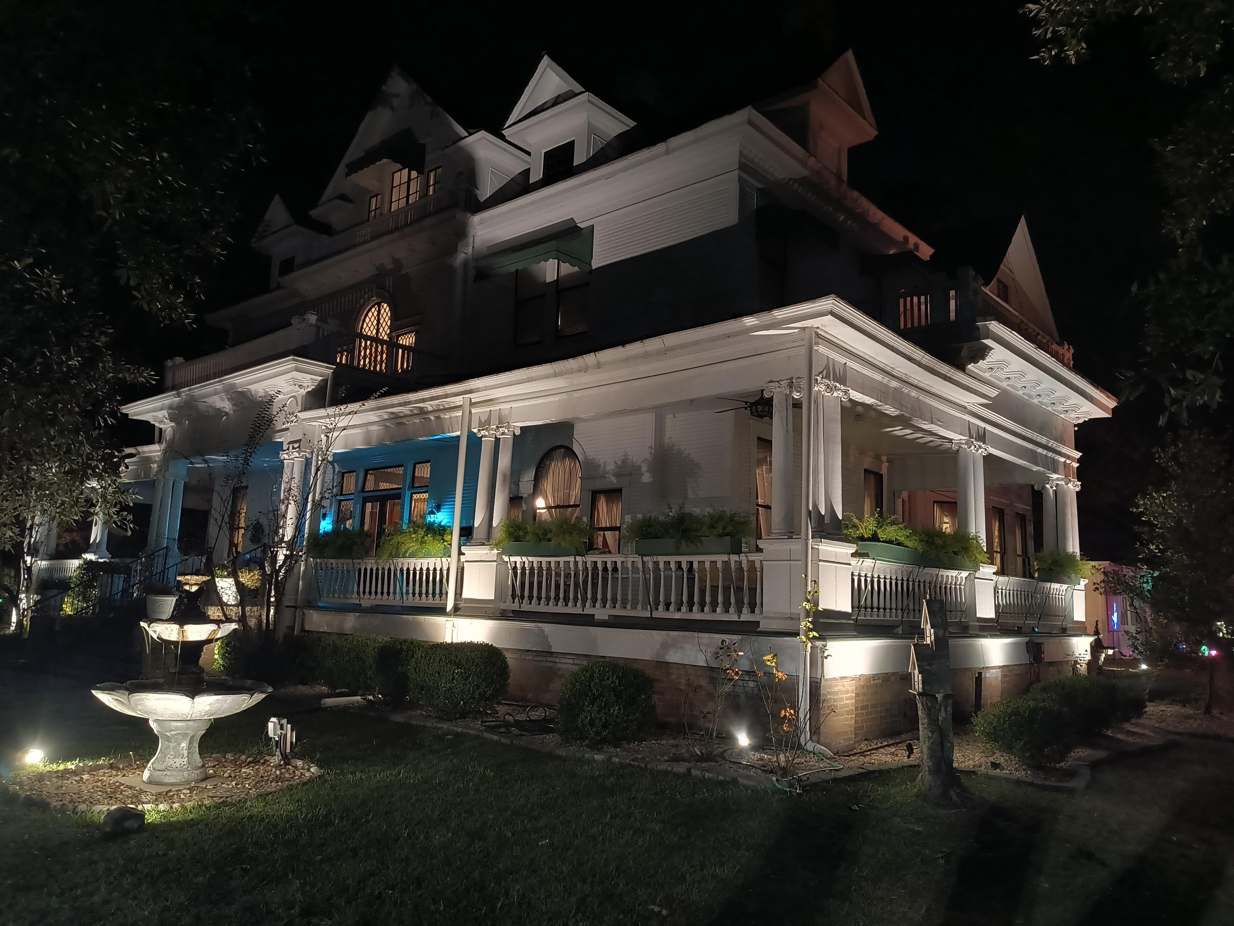 The lovely exterior all lit up at night