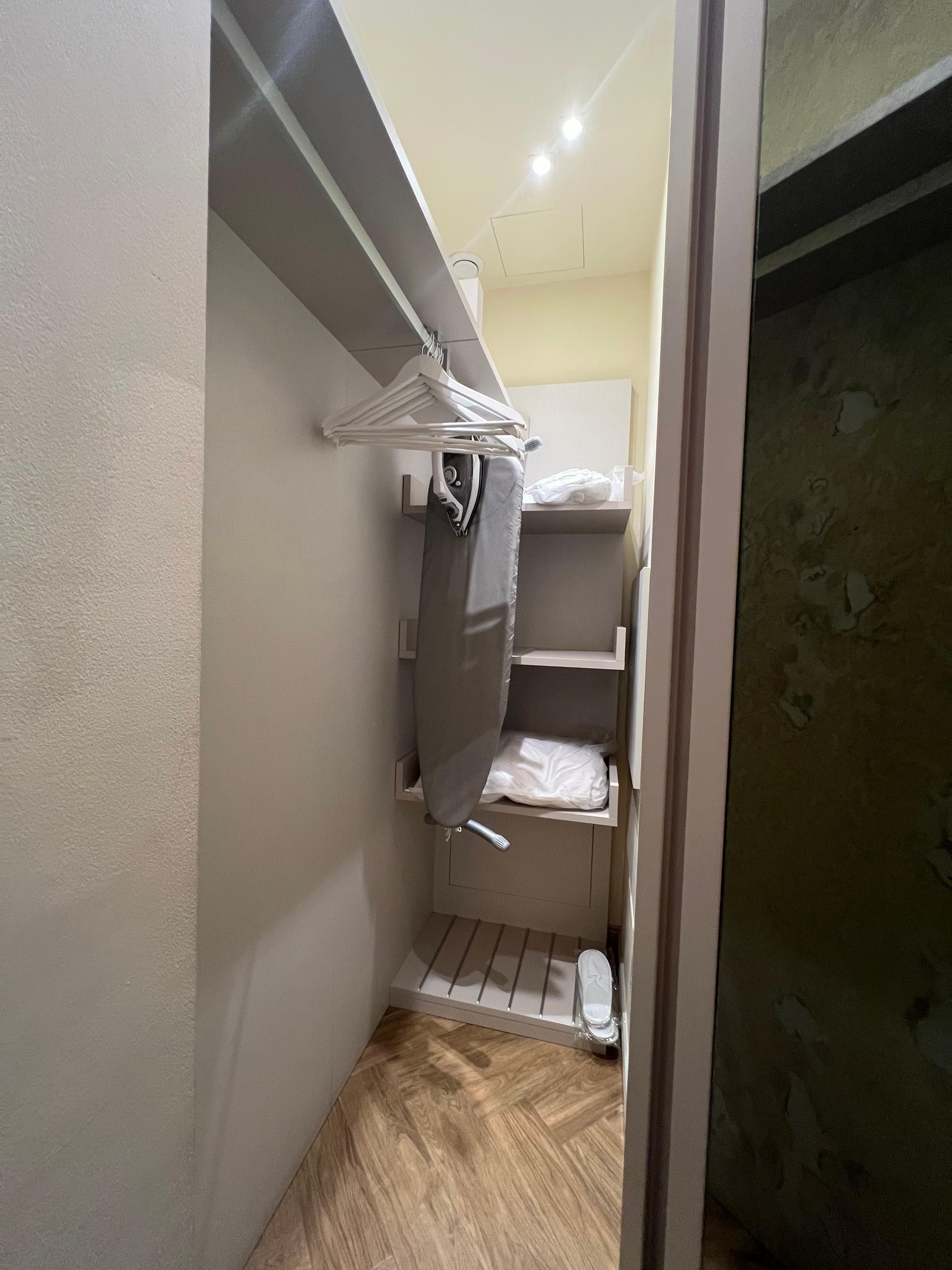 The closet through the right, mirrored door