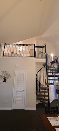 Looking up at the loft area. Which has 2 twin beds and a full bathroom.