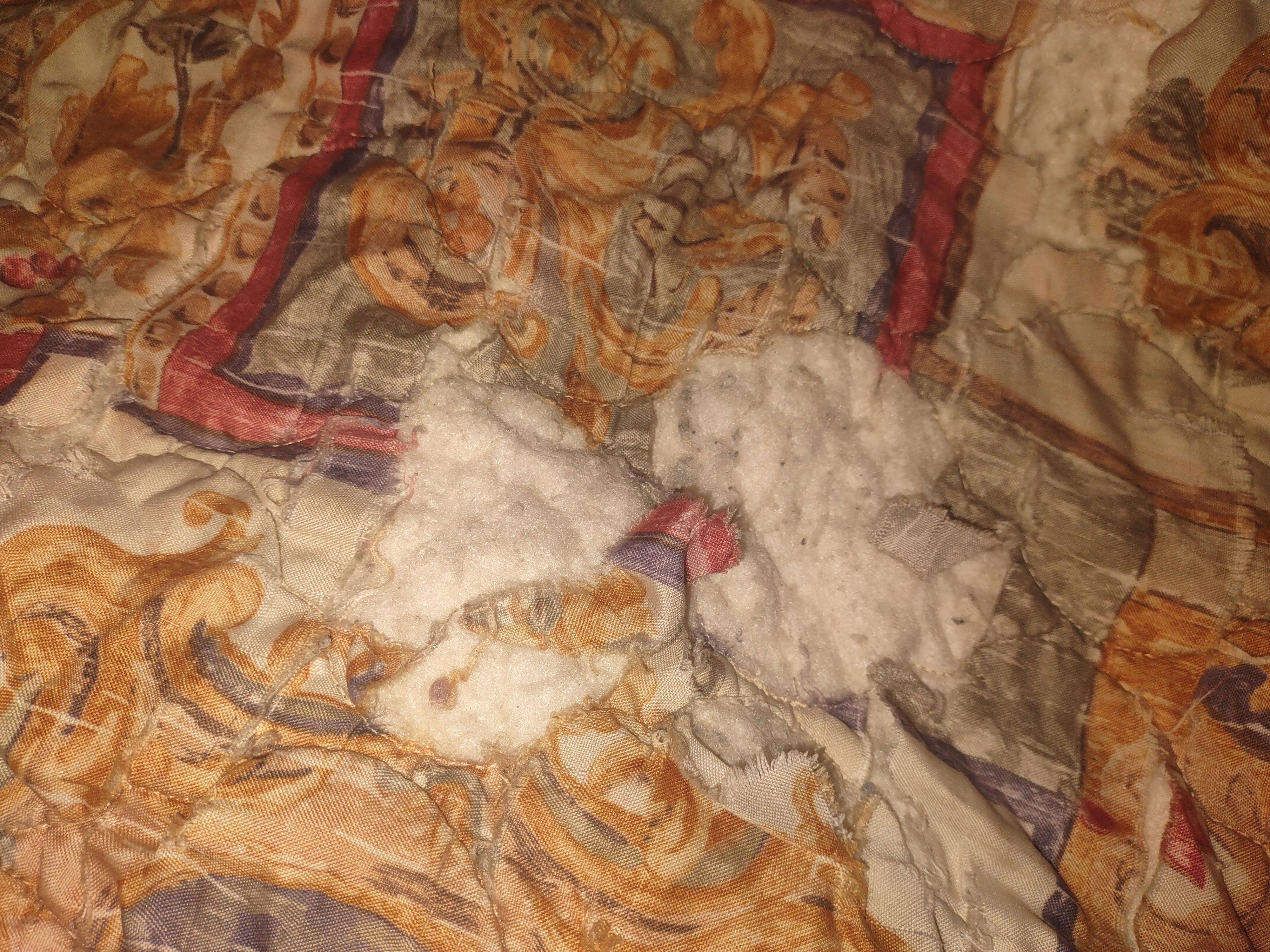 Blanket with blood stain unfolded