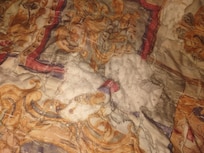 Blanket with blood stain unfolded