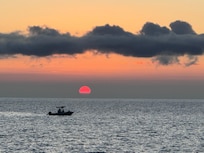 Sunset at the beach across the road.