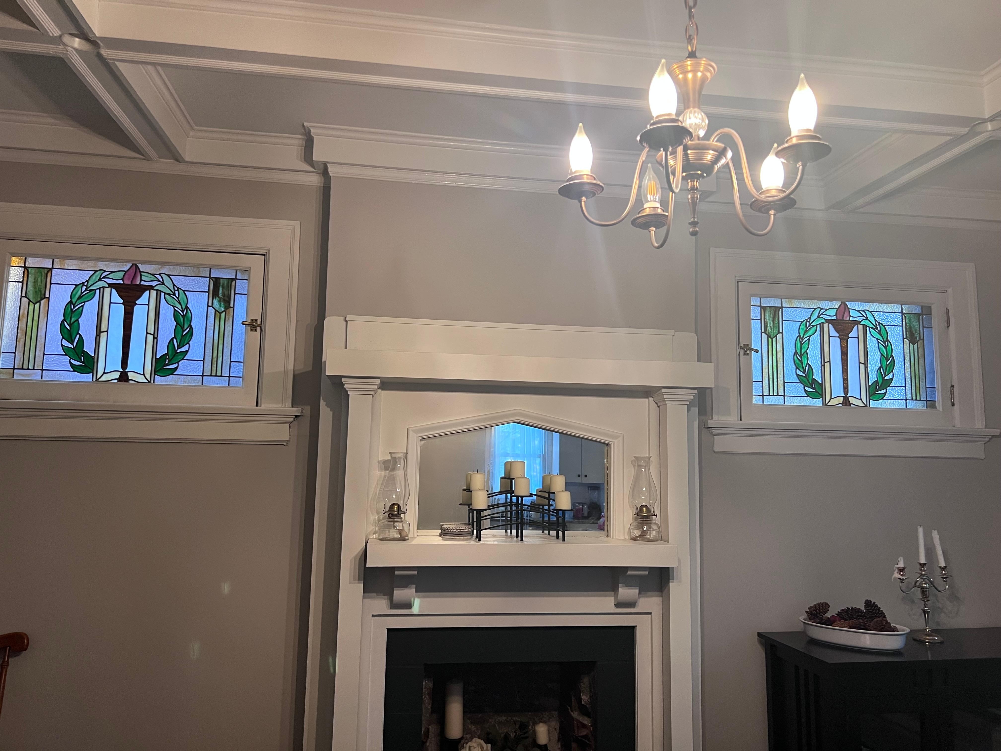 The nice fireplace and windows 