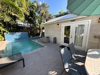 Back deck with guest cottage.