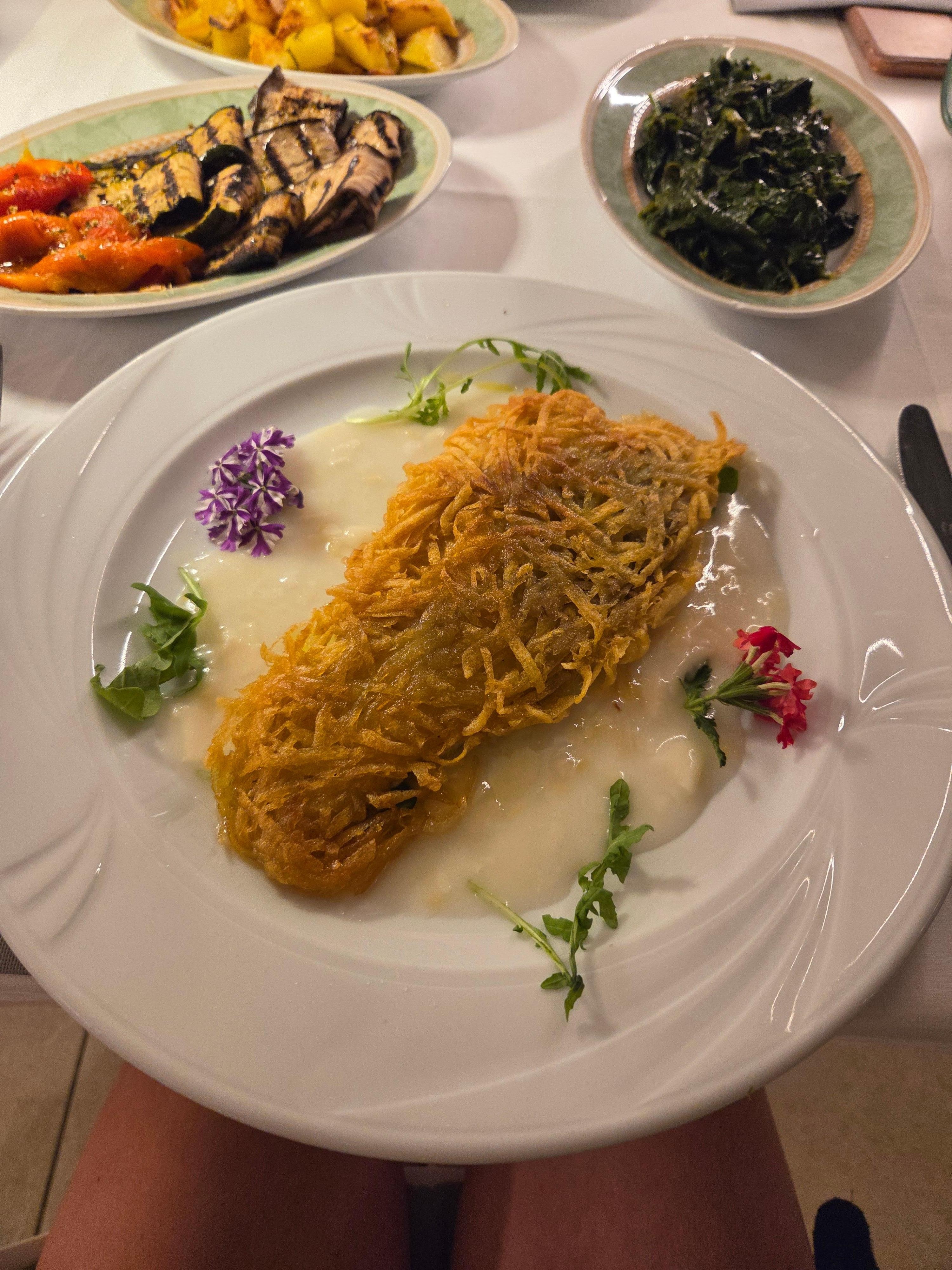 Seabass with a potato crust, in a citrus sauce, delicious 😋 