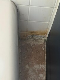 Bathroom floor between tub and vanity