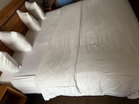 The bed sheets were dingy and miss colored