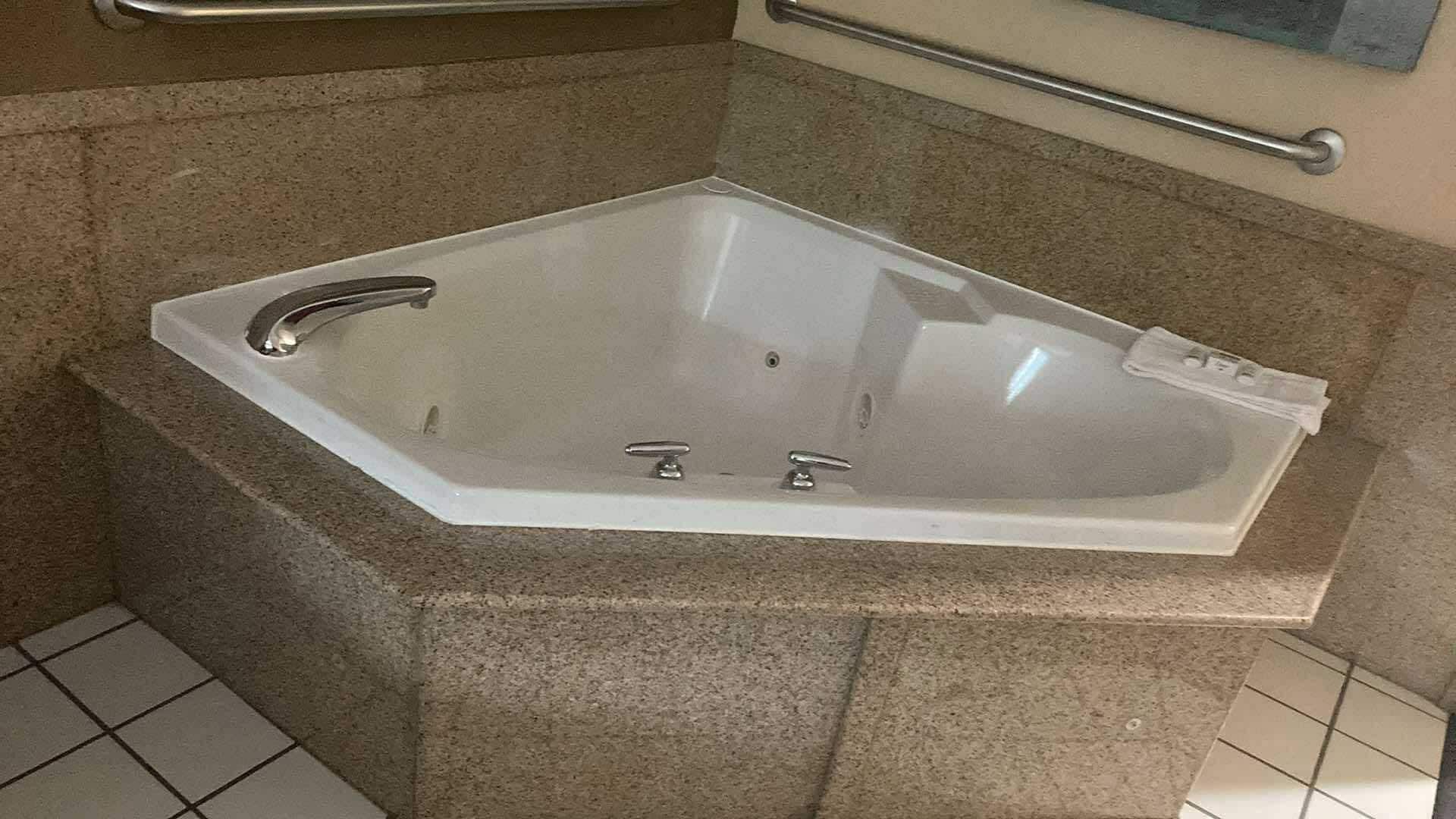 Hot tub fit two people comfortably 