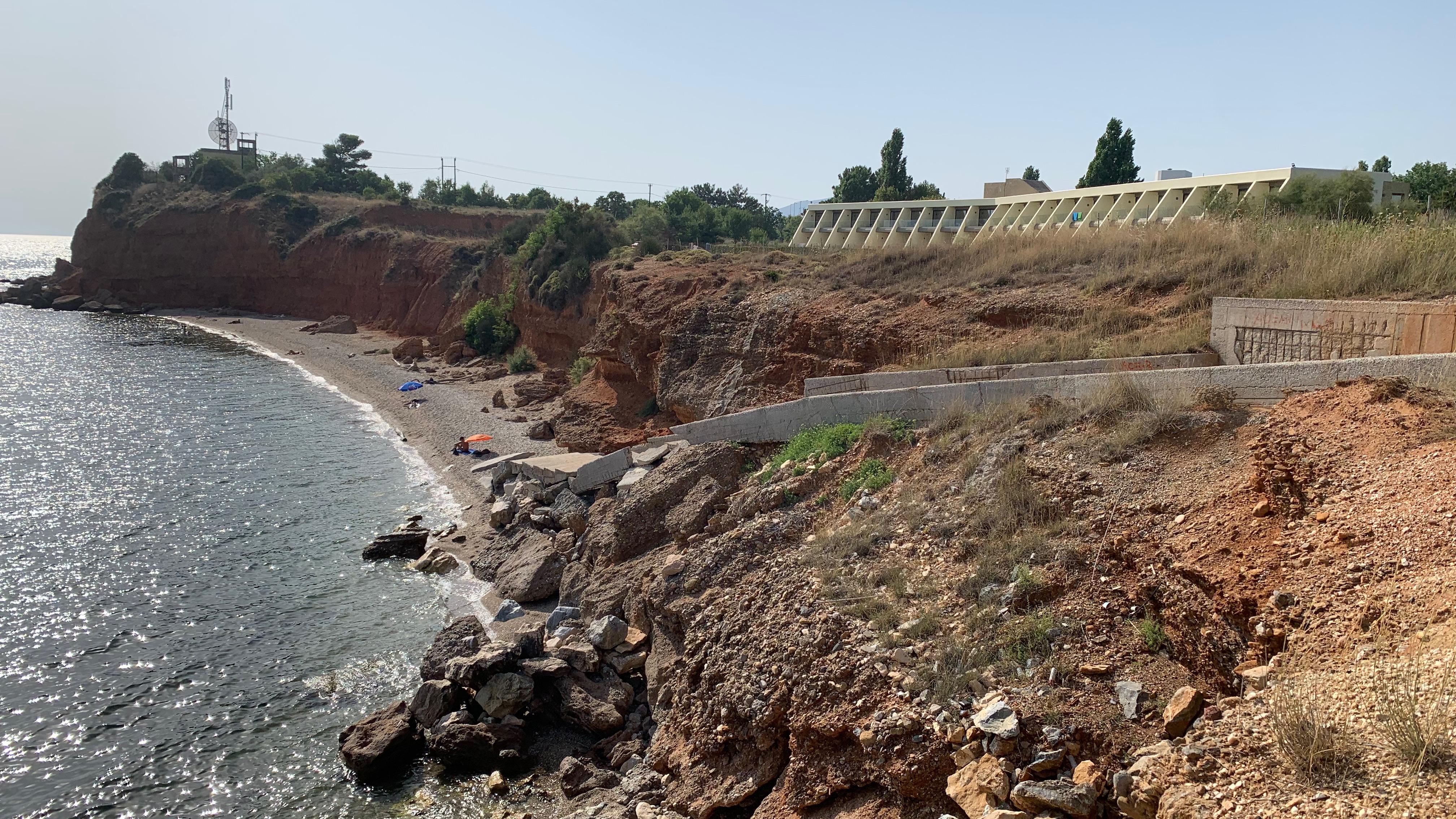 The beach below the hotel. The damaged ramp down is partly visible