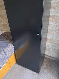 The only storage, with 2 coat hangers. The hotel thought this was acceptable for a week's stay. Living out of a suitcase.