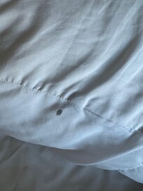 Stain one bed sheets