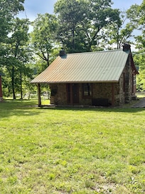 The adorable stone cabin