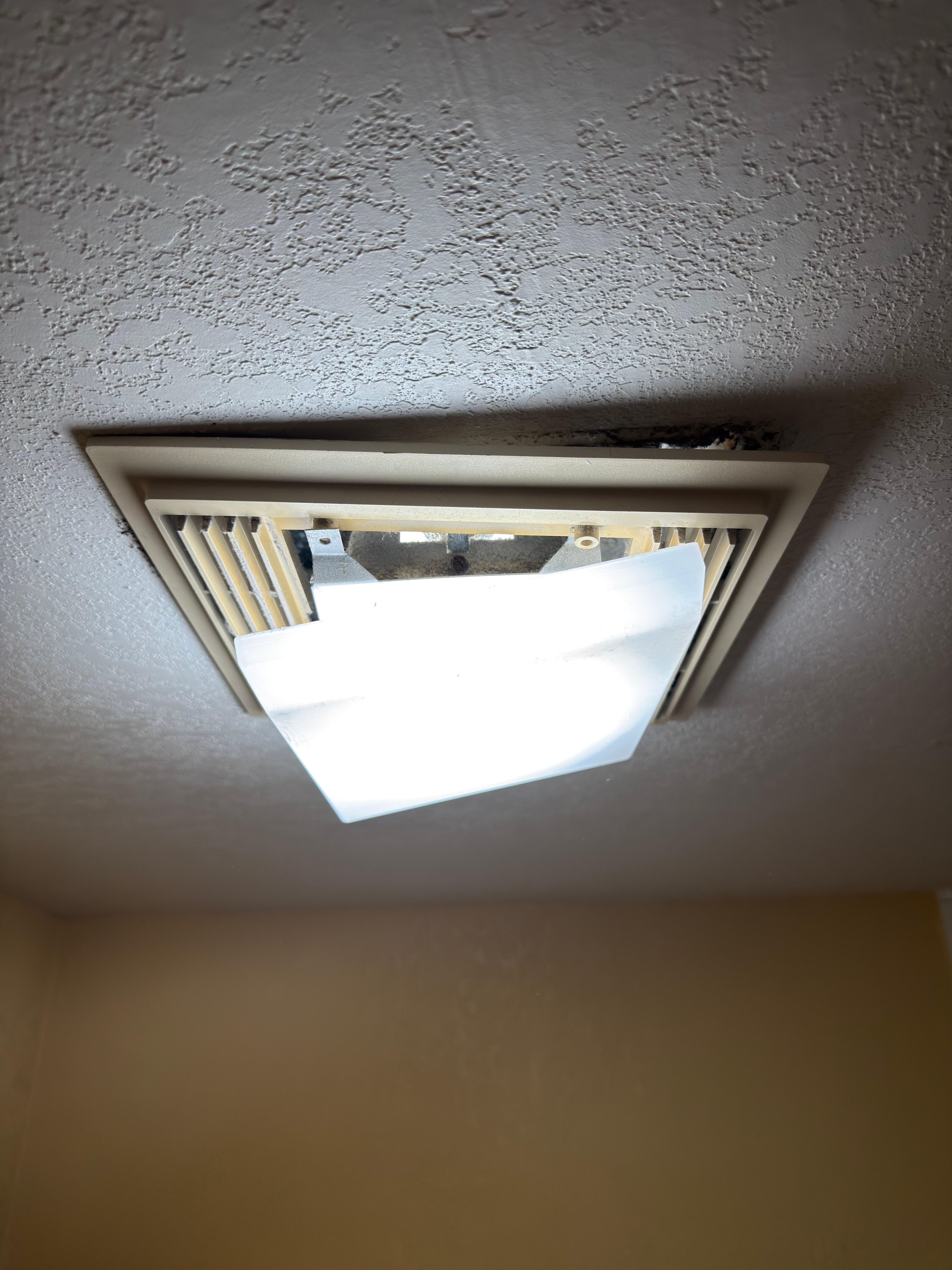 Bathroom fan not working and falling down