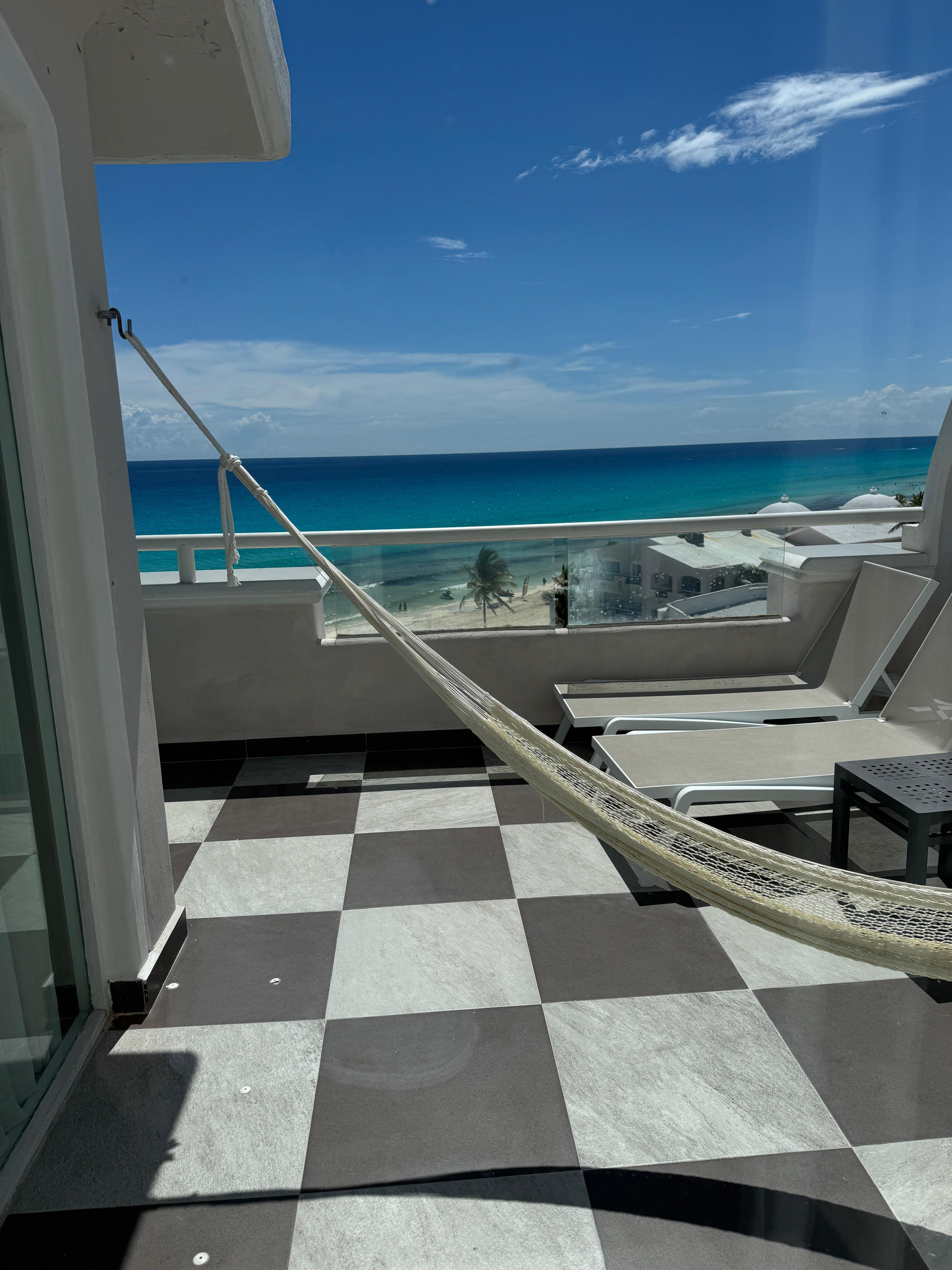 Private terrace with hammock and lounge chairs 