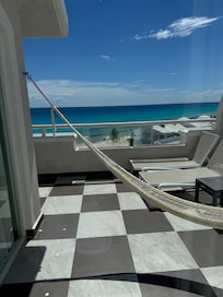 Private terrace with hammock and lounge chairs
