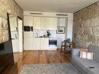 River View Balcony Apartment, living/kitchen space.