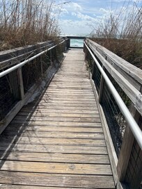 Beautiful beach just steps away.