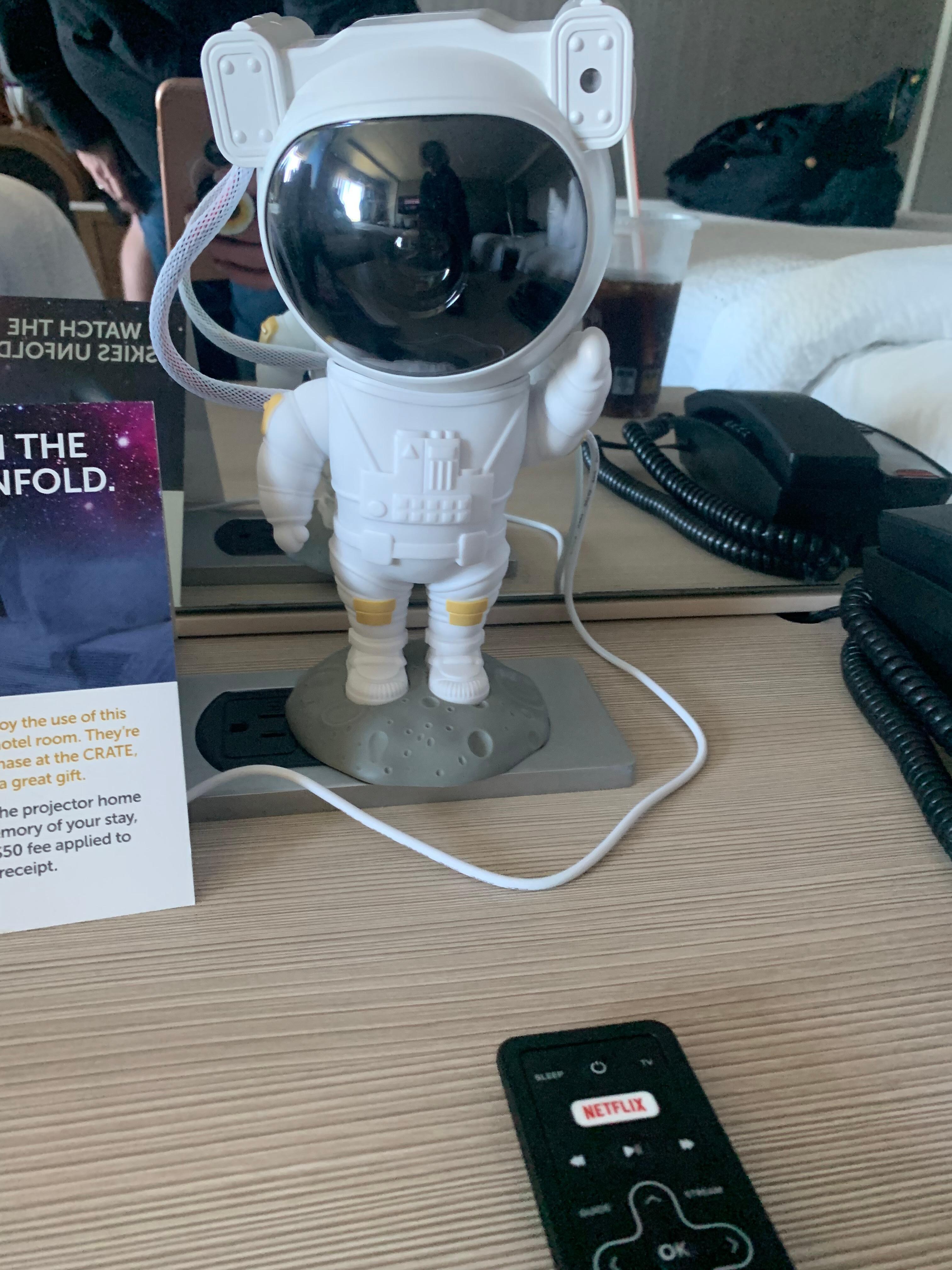 Super cool astronaut projector to watch starry skies on the wall or ceiling