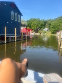 Guest patio right next to the rental property. Perfect area to hang out and watch the boats go by.