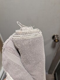 Worn out and mismatched towels.