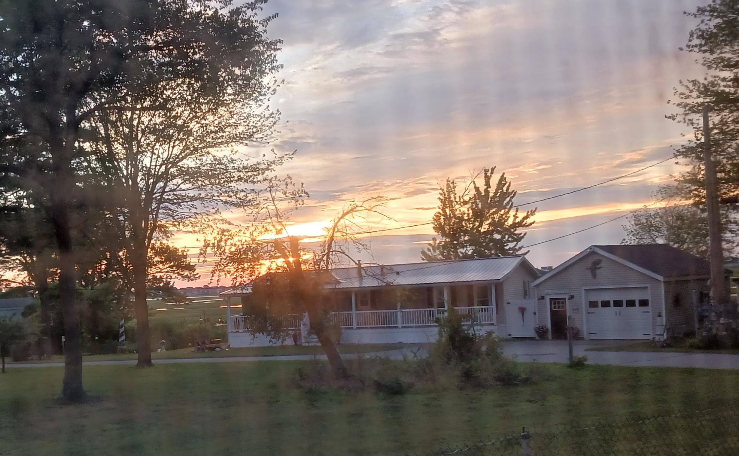 Sunrise across the street from the cottage over the marsh