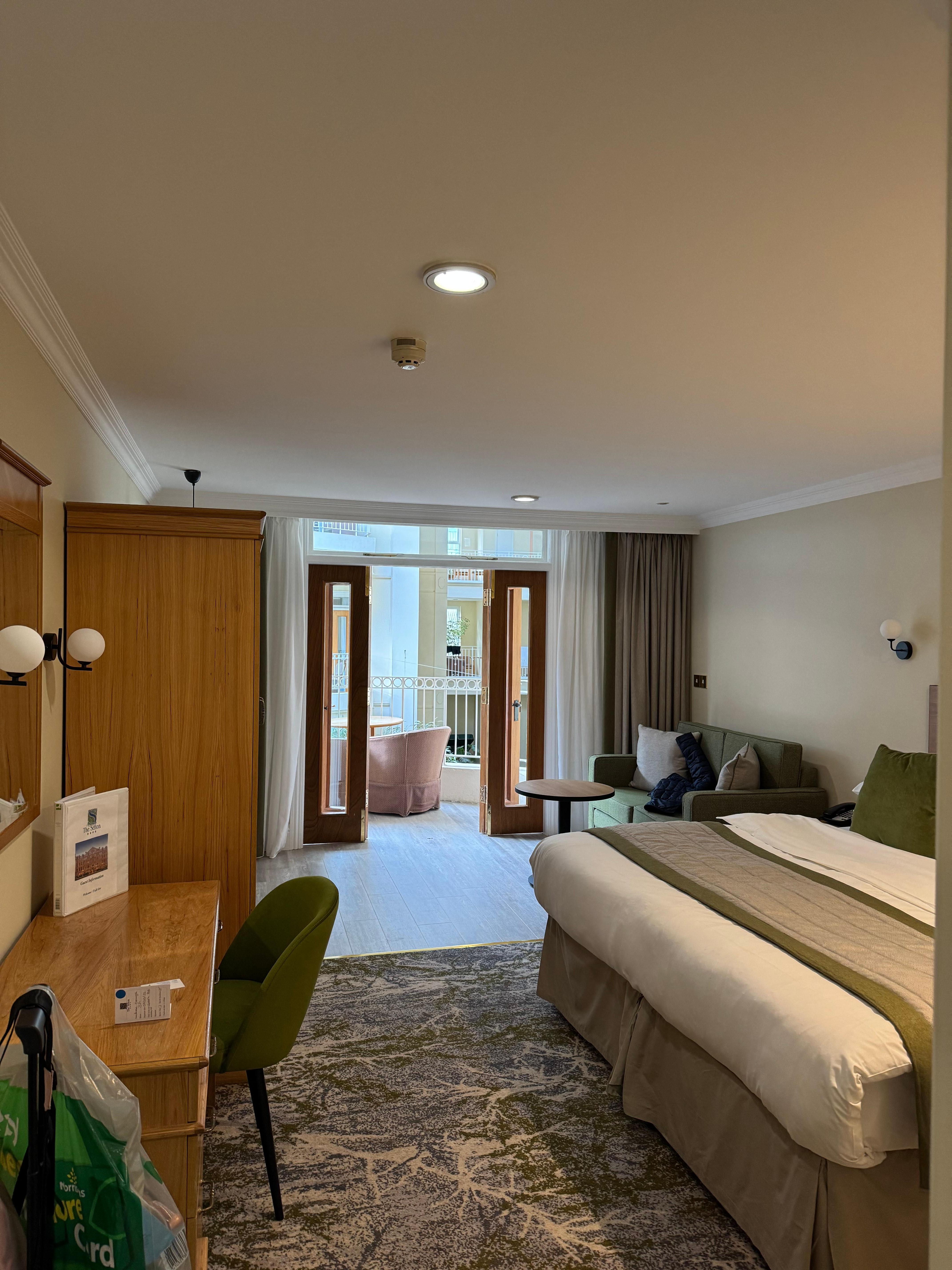 Doors to balcony over atrium gardens