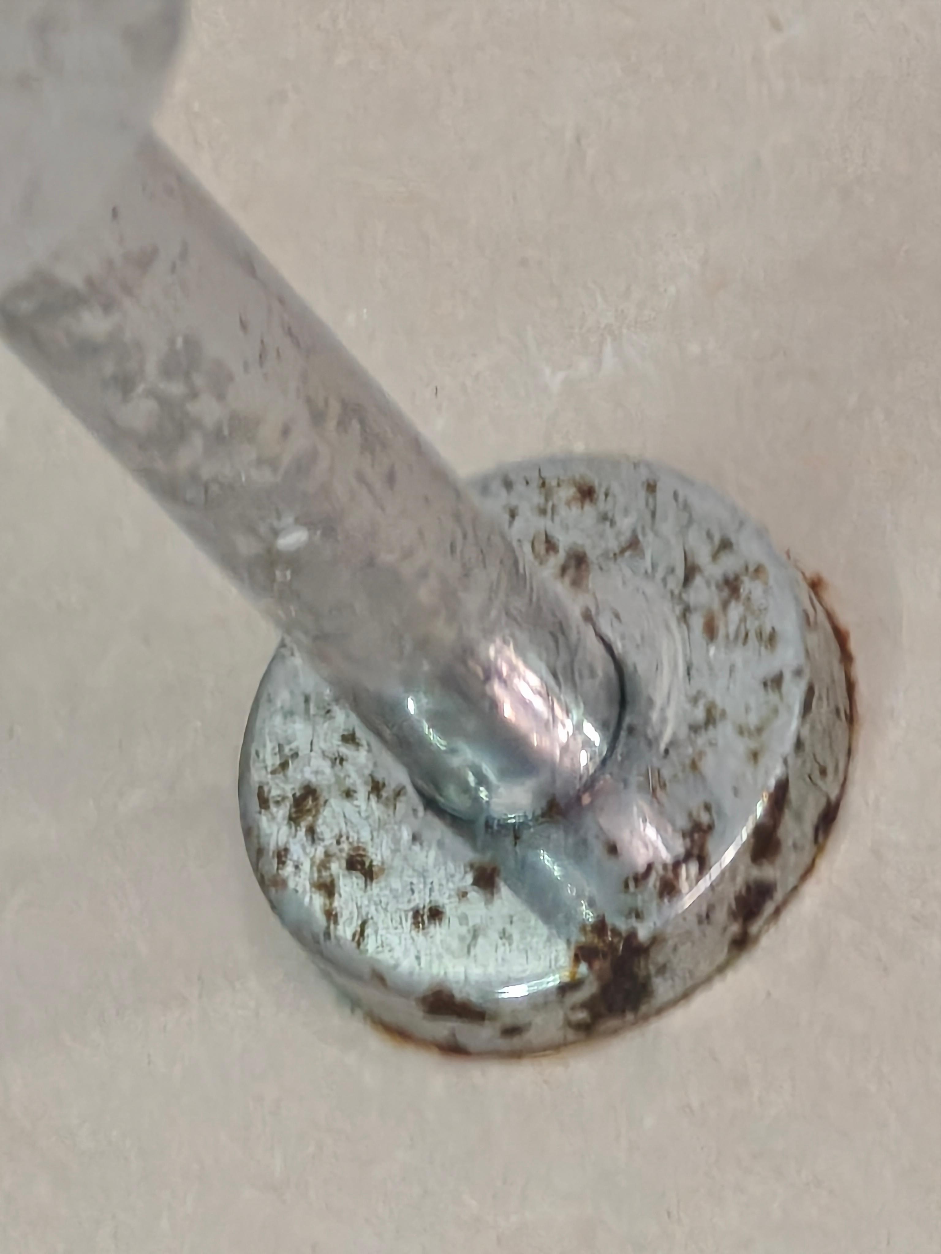 Haut du pommeau de douche ( plafond)