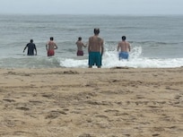 Guys in the ocean