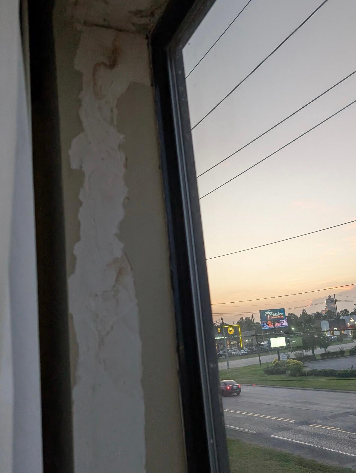 Peeling paint in window sill.
