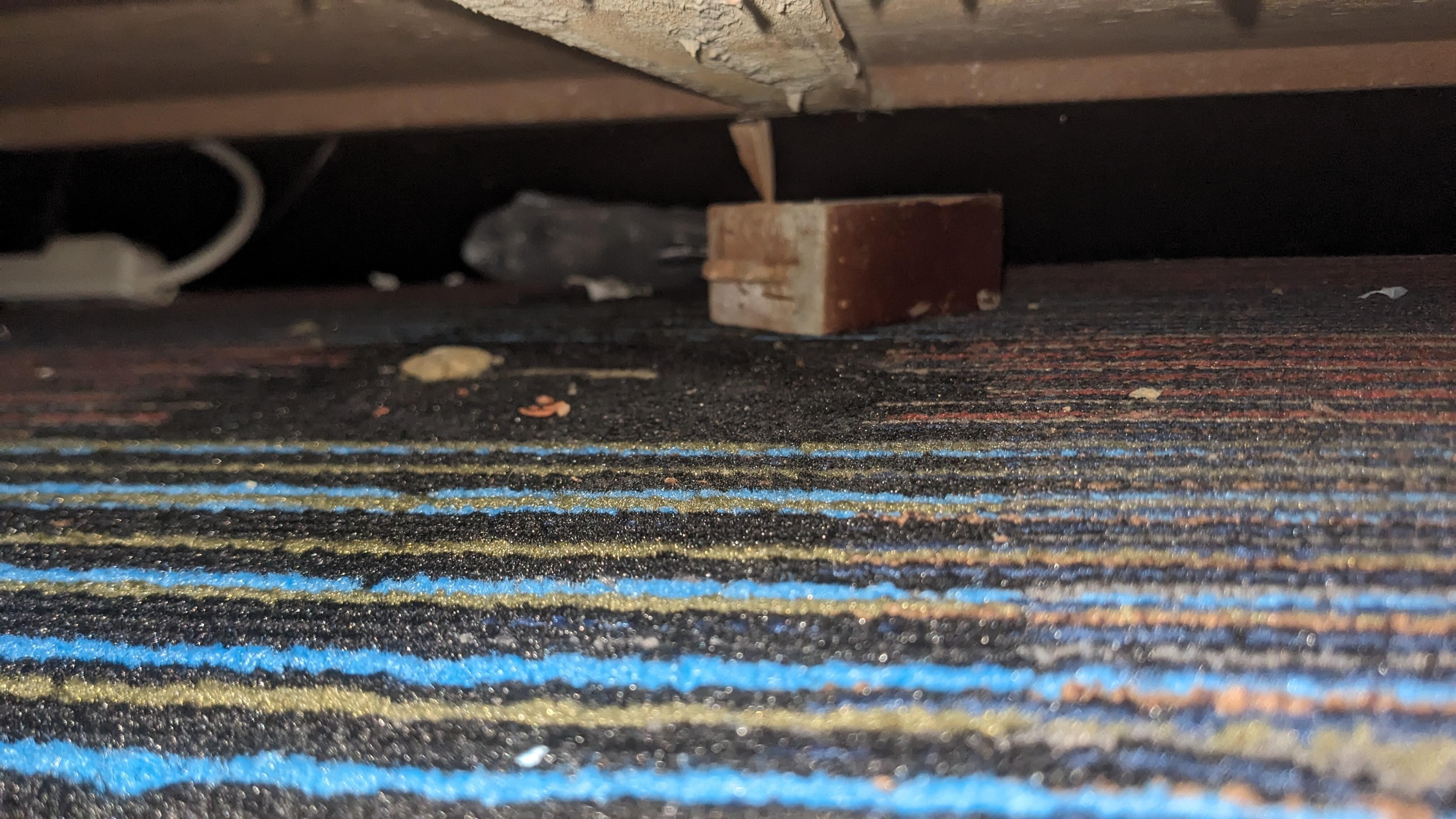 Under TV stand