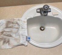 Wipes up a few drops of coffee on the floor