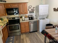 Cute little kitchen open to living room.