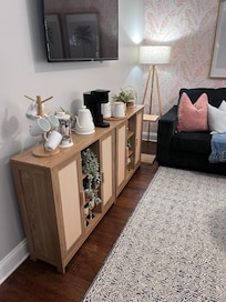 The living room has this adorable coffee station, plus the TV was logged into a couple streaming services.