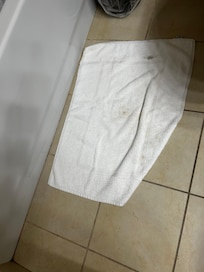 Stained towels with holes.