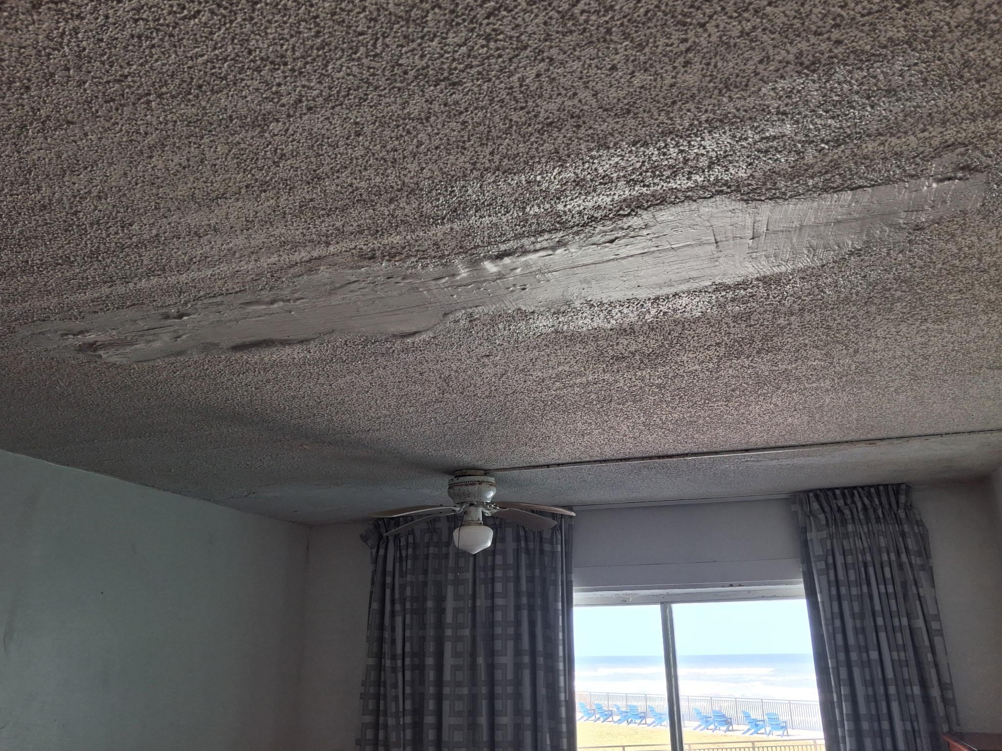 The ceiling in the room was falling down, cracked, holes around electric recepticles.