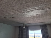 The ceiling in the room was falling down, cracked, holes around electric recepticles.