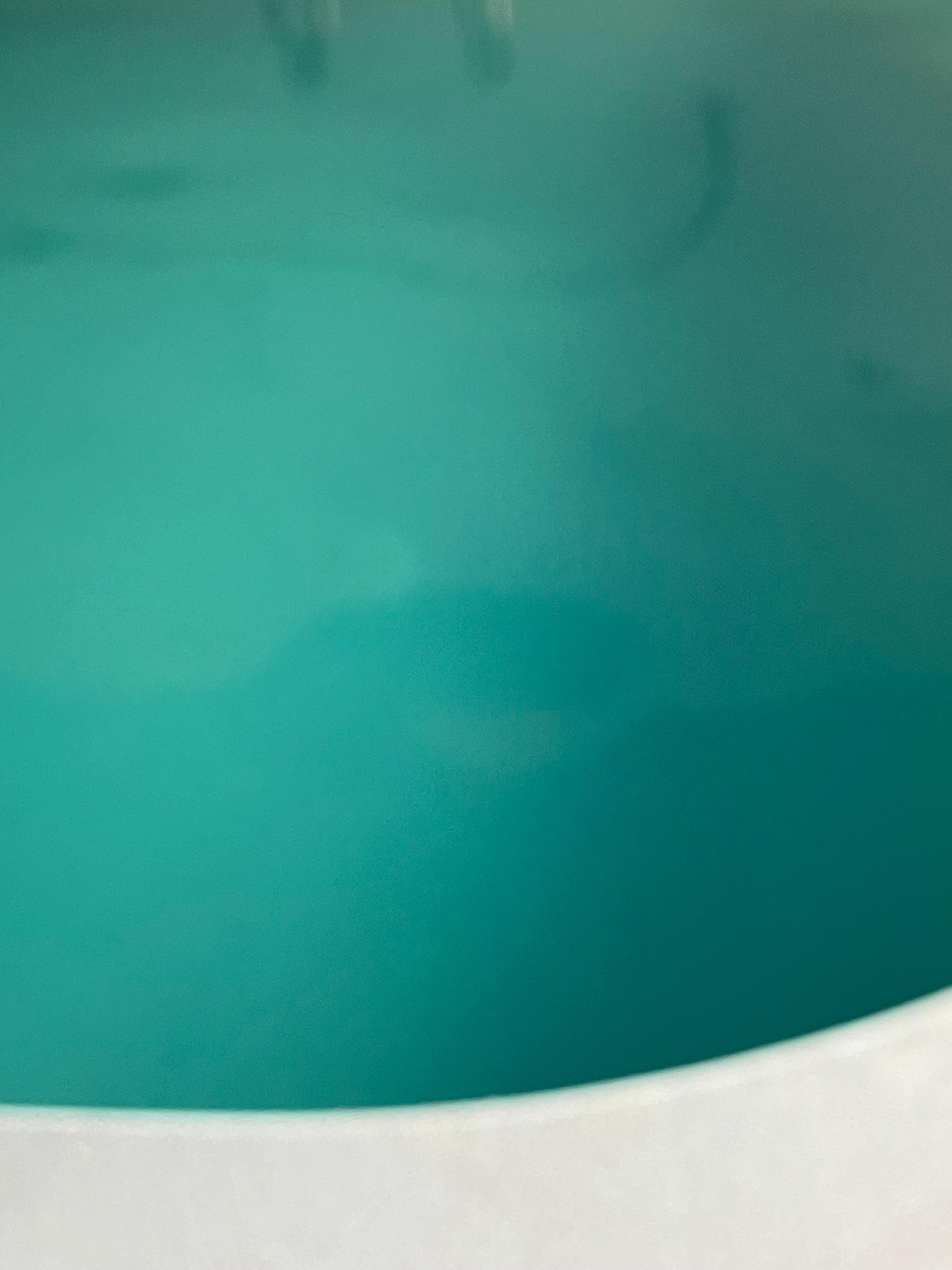 You can faintly see the pool filter at the bottom. Personally, I like to see the bottom of what I’m swimming in