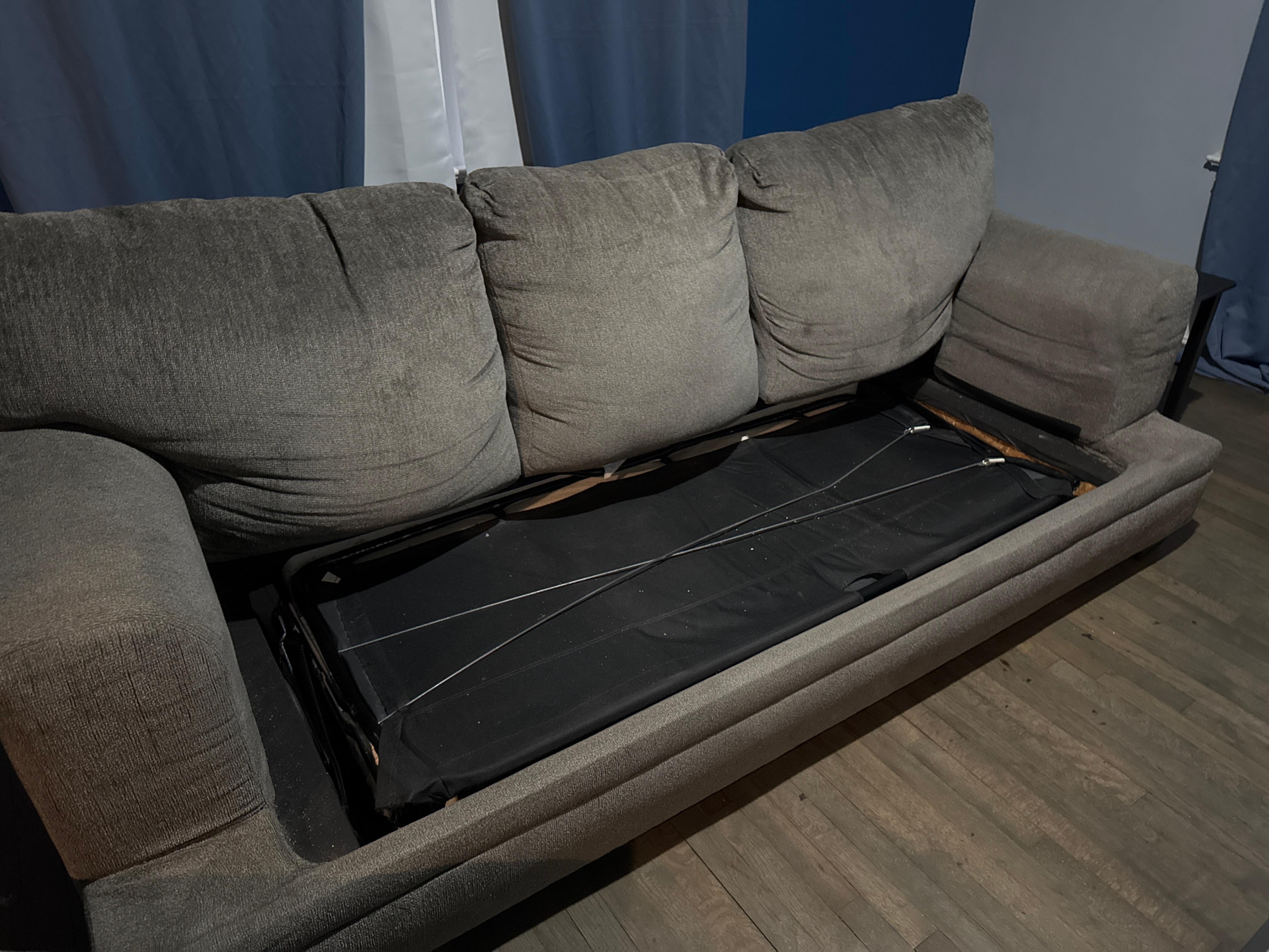 Sofa bed still folded in, was hopeful maybe sheets and bedding were already on the mattress, not there. Also, lots of crumbs on top of this part. Rug is non-existent as well.