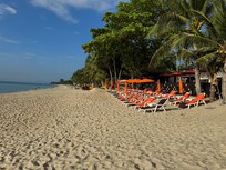 Beach beds reserved at 07:00 and not a person in sight