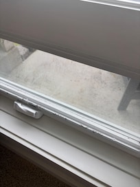 Dirty screens on windows and inside window sills