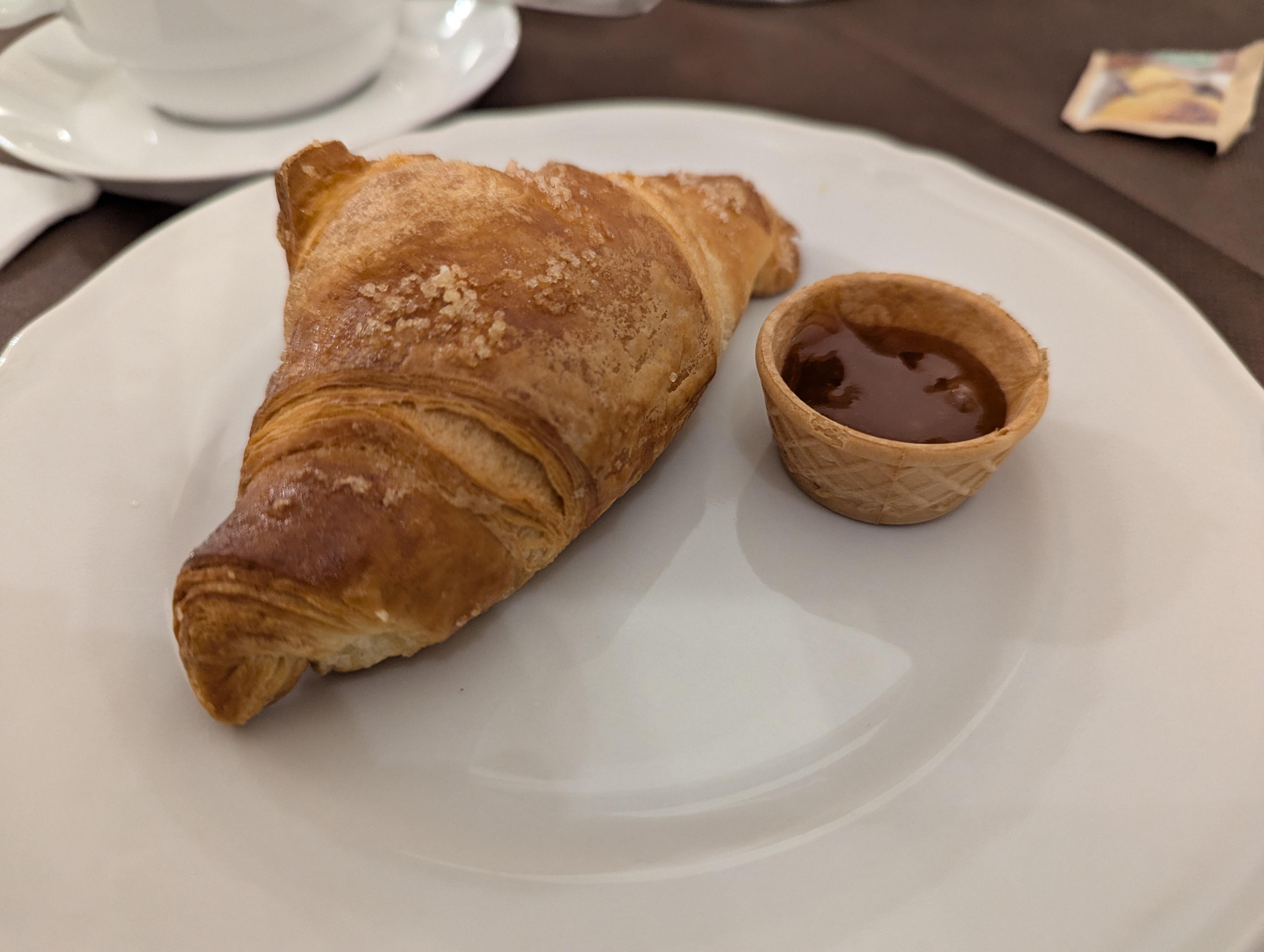 I really like the idea of using a little waffle cup for holding jams. The croissants are freshly baked and still warm, by the way.