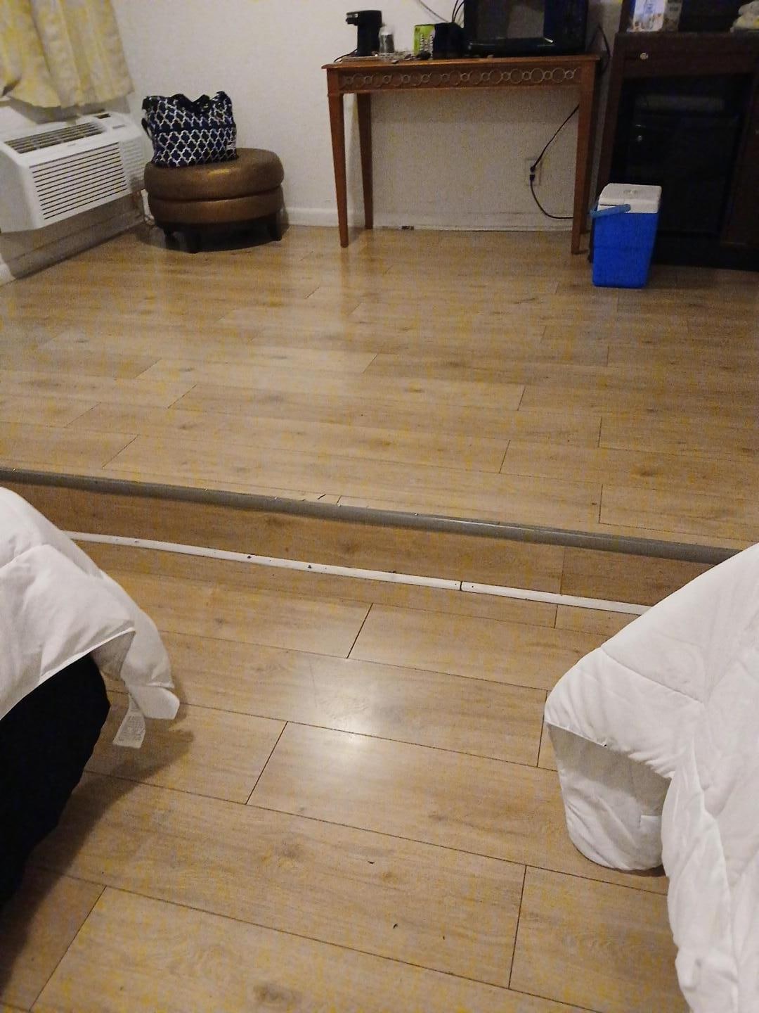 A heavy pinesol smell. Beds wete comfortable and clean.  Floor was slippery 