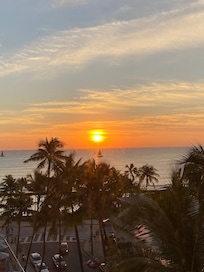 Majestic golden hour from ocean view bedroom
